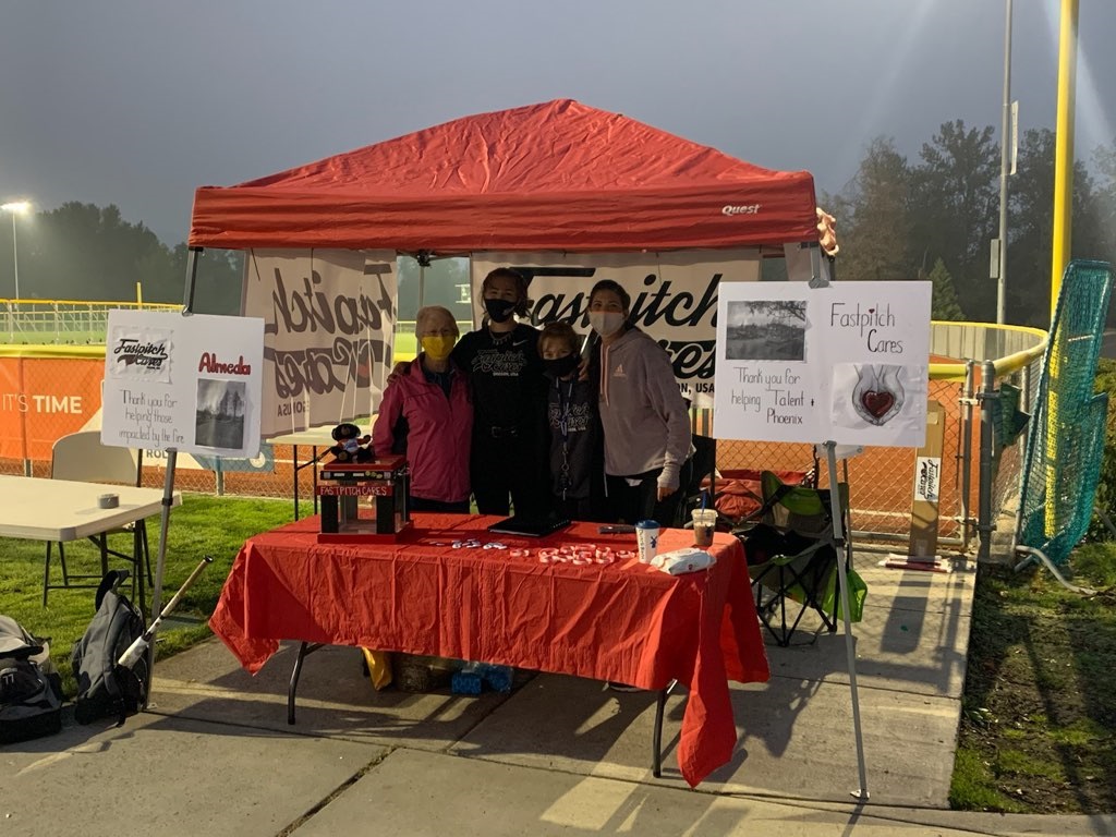 Fastpitch Cares community booth at softball event